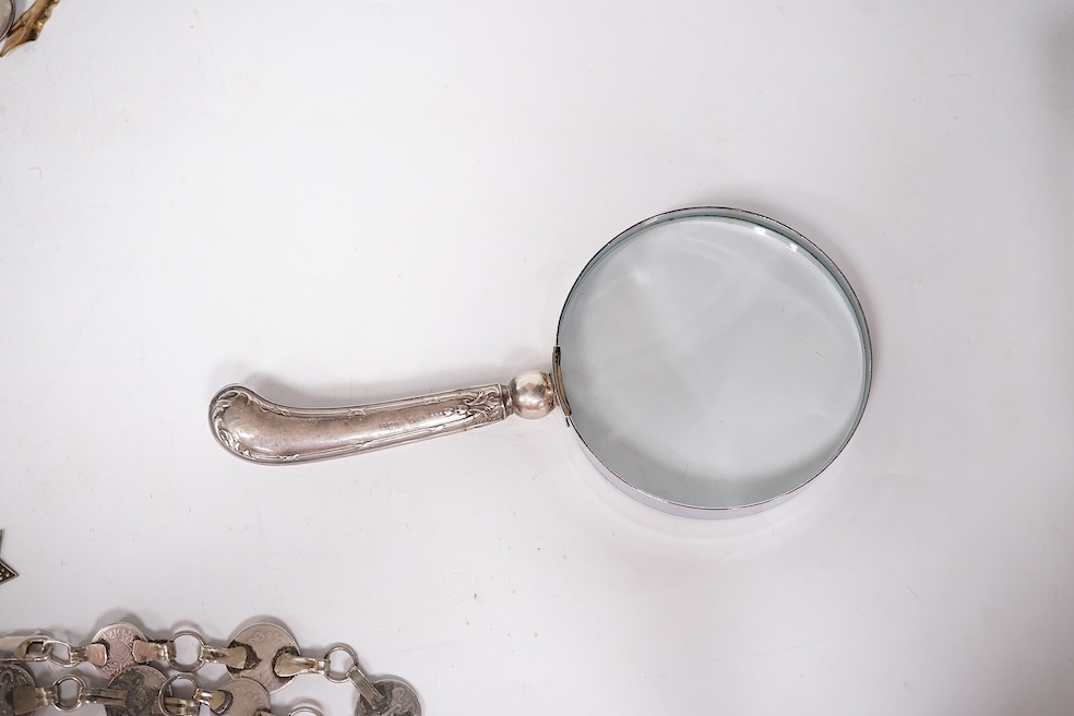 An early 1960's Georg Jensen sterling brooch, no. 339 (designed by Henning Koppel, 58mm, together with a small group of jewellery and other items including a pair of silver oval cufflinks, a Persian coin necklace, a 14ct